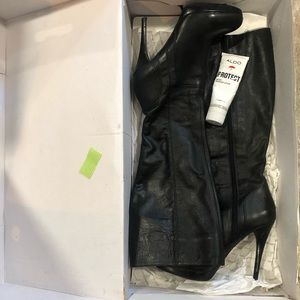 Size 38 Aldo leather stiletto knee high boots. Black.